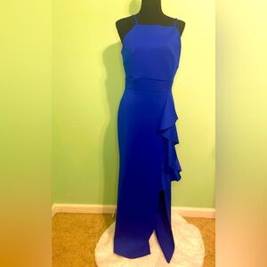Blue formal dress with a slit.